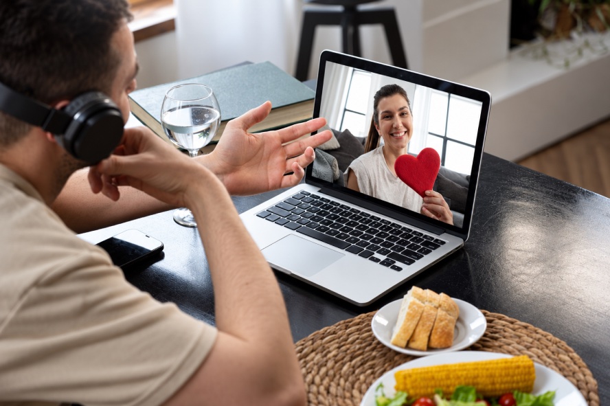 Long distance theme with a video call on a laptop